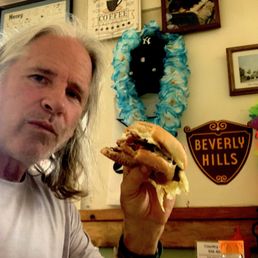 a man eating a sandwich