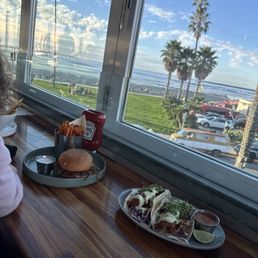 Happy hour with an ocean view! Smash burger & 2 fried tacos! Happy hour with an ocean view! Smash burger & 2 fried tacos!