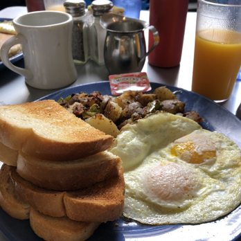 Cafe 222 - Two eggs, grilled potatoes and toast. - Breakfast & Brunch Near Me - San Diego, California