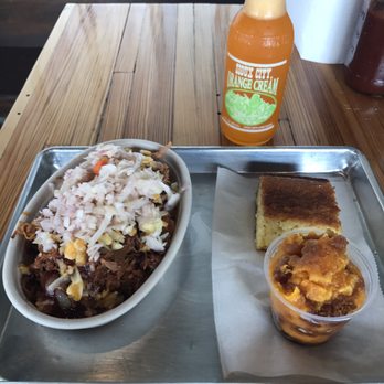 Big Black Grill - Pulled pork bowl with dirty rice, shredded colby jack cheese, and sweet and sour slaw. Side of corn bread, and sweet potato casserole. - Barbeque Near Me - New Stanton, Pennsylvania