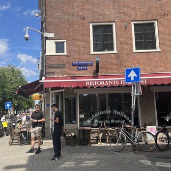 Piccolo Mondo - Limited outdoor seating on quieter streets corner. - Italian Near Me - Amsterdam, New Hampshire