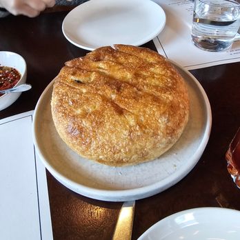 Ci Siamo - Cast Iron Focaccia. $18. Served with tomato conserva. Delicious/highly recommended - Italian Near Me - New York, New York Ci Siamo - Cast Iron Focaccia. $18. Served with tomato conserva. Delicious/highly recommended - Italian Near Me - New York, New York