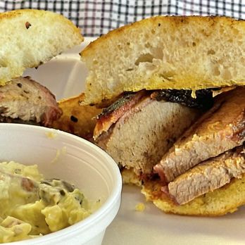 Smokin' Joe's BBQ - Brisket sandwich on a Ciabatta bun with a side of potato salad. Excellent bark on the brisket. Thick yet tender slices of meat. - Barbeque Near Me - Redding, California