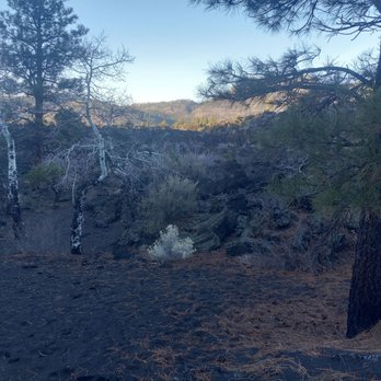 Sunset Crater Volcano National Monument - Black ash after volcanic eruption. - Landmarks & Historical Buildings Near Me - Flagstaff, Arizona