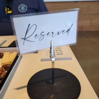 Coche Vino Wine Tours - a reserved sign - Wine Tours Near Me