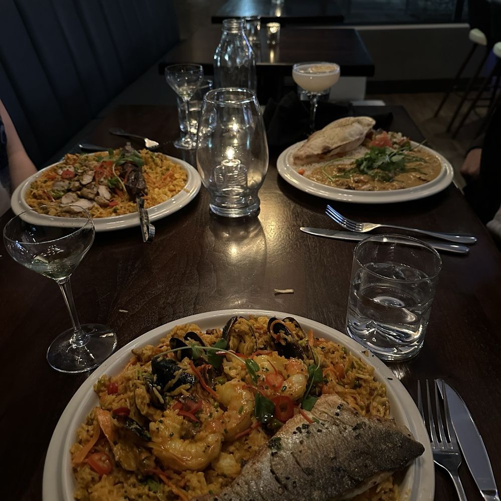 Ambli Global Cuisine - DTC - Paella fish, paella beef and Kuku Paka. - Tapas/Small Plates Near Me - Denver, Colorado Ambli Global Cuisine - DTC - Paella fish, paella beef and Kuku Paka. - Tapas/Small Plates Near Me - Denver, Colorado