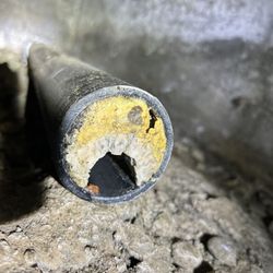 Capitol Plumbing & Hydro-Jetting Service - Shows clog and how past plumbers snaked it, no bueno.
