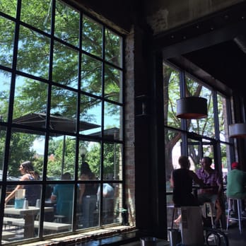 Dos Santos - Outside seating area and cool windows - Mexican Near Me - Denver, Colorado Dos Santos - Outside seating area and cool windows - Mexican Near Me - Denver, Colorado