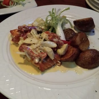 Marco's - Salmon Oscar, salmon with crab on top served with asparagus and potatoes - Italian Near Me - Marlton, New Jersey Marco's - Salmon Oscar, salmon with crab on top served with asparagus and potatoes - Italian Near Me - Marlton, New Jersey