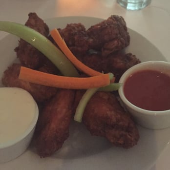 Mim's Restaurant - Meaty Naked Wings with Buffalo sauce on the side. Bad lighting sorry. They looked better in person.  8-7-2016 - American Near Me - Roslyn Heights, New York