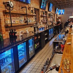 Rams Pint House & Rooftop Lounge - The 30 yard bar on the first floor ,super huge