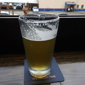 Red Door Saloon - Cold beer with the garage door open! - Bars Near Me - Nashville, Tennessee