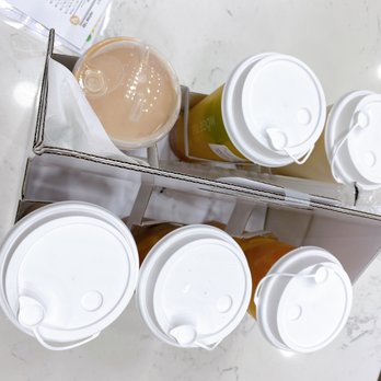 Möge Tee Duluth - a box of coffee cups - Bubble Tea Near Me - Duluth, Georgia Möge Tee Duluth - a box of coffee cups - Bubble Tea Near Me - Duluth, Georgia
