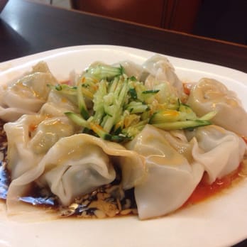 New Shanghai - Taiwanese chilli wontons garnished with chilli cucumber. - Shanghainese Near Me - Chatswood, NSW New Shanghai - Taiwanese chilli wontons garnished with chilli cucumber. - Shanghainese Near Me - Chatswood, NSW