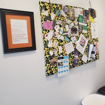 QWENCH juice bar - a wall with a bunch of posters on it - Juice Bars & Smoothies Near Me - Sherman Oaks, California