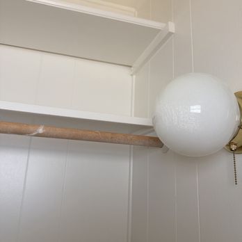 JC Handyman Services - Overspray on light and closet bar - Handyman Near Me