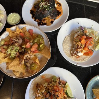 Three's Bar & Grill - Kalua Pork Nachos (left), Portobello Mushroom (top), Coconut Crusted Fish Taco (right and bottom) - Asian Fusion Near Me - Kihei, Hawaii Three's Bar & Grill - Kalua Pork Nachos (left), Portobello Mushroom (top), Coconut Crusted Fish Taco (right and bottom) - Asian Fusion Near Me - Kihei, Hawaii