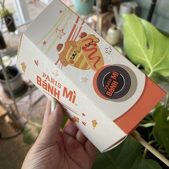Paris Banh Mi - Paris Banh Mi to-go container for their corn dogs - so cute! - Sandwiches Near Me - Troy, Michigan