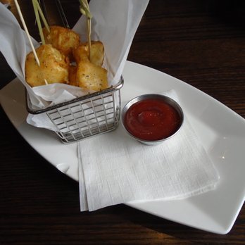 Pier 500 - Brie cheese curds with lingonberry ketchup dipping sauce. - American Near Me - Hudson, Wisconsin Pier 500 - Brie cheese curds with lingonberry ketchup dipping sauce. - American Near Me - Hudson, Wisconsin