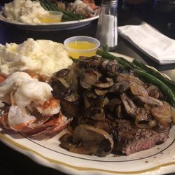 Sirna's Cafe - 10oz Ribeye and 4oz lobster tail with mashed potatoes and green beans. Yum!