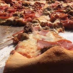 Eudici's Pizza - had to order with Extra cheese and toppings.