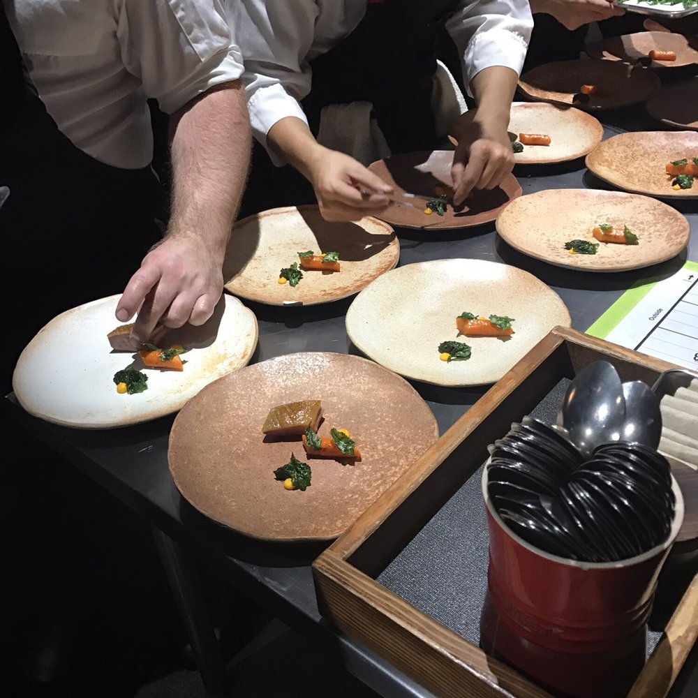 Lazy Bear - Chefs preparing the dry aged duck with yam, maple and black kale gremolada - New American Near Me - San Francisco, California
