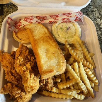 Raising Cane's Chicken Fingers - The Box Combo (4 pieces) - Chicken Shop Near Me - Roseville, California Raising Cane's Chicken Fingers - The Box Combo (4 pieces) - Chicken Shop Near Me - Roseville, California