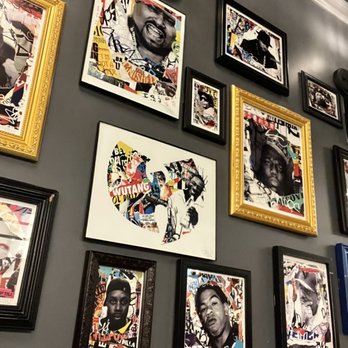 Beatstro - One of the picture walls by the dining area - American Near Me - Bronx, New York