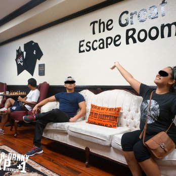 The Great Escape Room - Comfy couch in lobby... but also a perfect backdrop (complete with props- not pictured) for photos - Escape Games Near Me - Orlando, Florida
