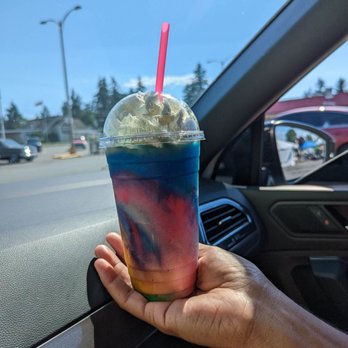Copper Coins Coffee - a hand holding a cup of coffee - Coffee & Tea Near Me - Parkland, Washington Copper Coins Coffee - a hand holding a cup of coffee - Coffee & Tea Near Me - Parkland, Washington