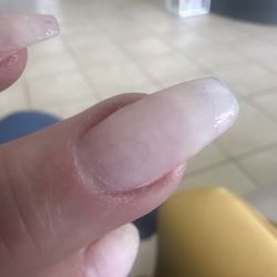 Cici's Nail and Spa - Hair embedded in acrylic.