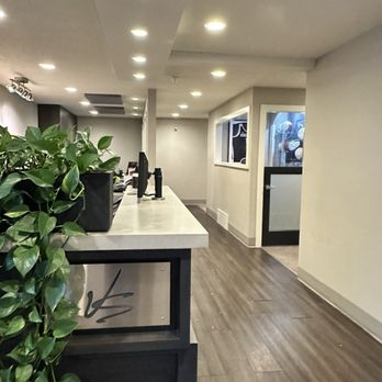 Garland Vision Source - Front desk and the hall you'll walk down for exams - Optometrists Near Me - Spokane, Washington Garland Vision Source - Front desk and the hall you'll walk down for exams - Optometrists Near Me - Spokane, Washington