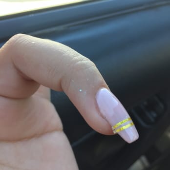 Dynasty Salon - Acrylic powder all over my finger and the strips that are hanging off - Nail Salons Near Me - South Pasadena, California