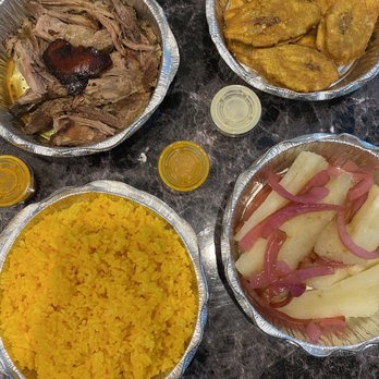 Puerto Viejo - Pernil, tostones, yucca with onions, and yellow rice. - Dominican Near Me - Brooklyn, New York
