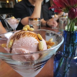 Park City Food Tours - House made strawberry ice cream from Zoom Restaurant with candied pine nuts and pomegranate syrup. I'm tell ya, it's amazing.