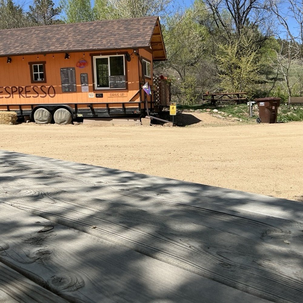 View of the establishment from the shaded picnic table out front (there's more around back). View of the establishment from the shaded picnic table out front (there's more around back).