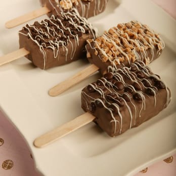 Aunt Flo's Chocolates - Rice Krispie Treat's come with chocolate chips, english toffee, M&M's, or crushed Snicker's. Need I say more!! - Chocolatiers & Shops Near Me