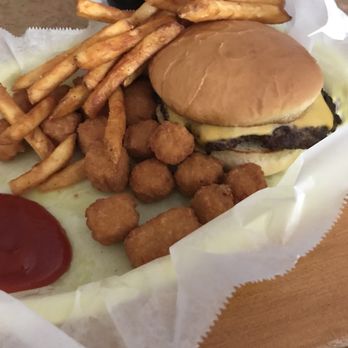 The Tavern - Cheeseburger with seasoned fries and spicy pepper jack balls - Bars Near Me - Niles, Michigan