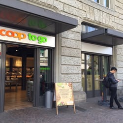 Coop - Front of store. Also has standing eating and smoking area tables outside on the right