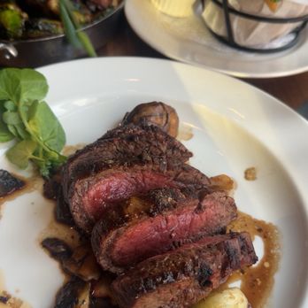 The Capital Grille - Sliced Filet Mignon with Cipollini Onions, Wild Mushrooms and Fig Essence - Steakhouses Near Me - Clayton, Missouri