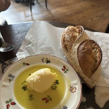 Little Sparrow - Complimentary bread with amazing butter and salt - French Near Me - Atlanta, Georgia