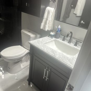 Michael Remodeling - Toilet, sink, mirror, vanity. - General Contractors Near Me - Chicago, Illinois
