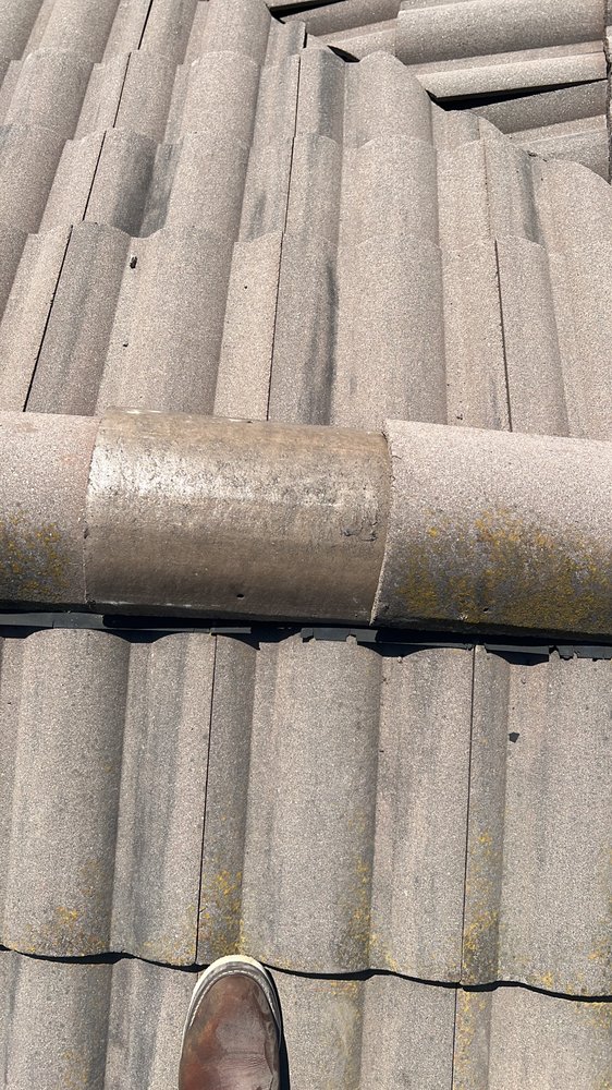 Slide of Israel Professional Roofer