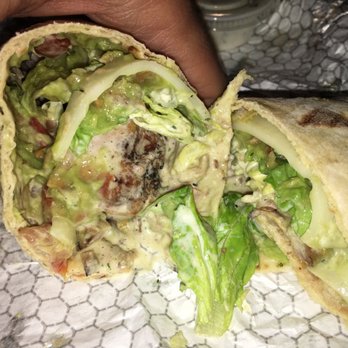 Pollo Tropical - Exposed chicken alvacado bacon wrap. Hope it taste better than it looks. Outer wrap is ice cold - Fast Food Near Me - Cooper City, Florida Pollo Tropical - Exposed chicken alvacado bacon wrap. Hope it taste better than it looks. Outer wrap is ice cold - Fast Food Near Me - Cooper City, Florida