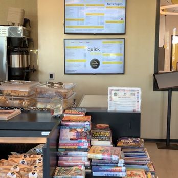 Beelove Cafe - a table full of books - Coffee & Tea Near Me - Chicago, Illinois