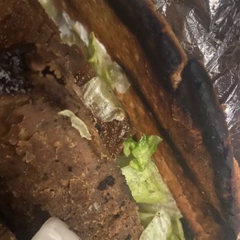 Mr. Greek - a closeup of a sandwich with lettuce and meat - Greek Near Me - Scarborough, Ontario