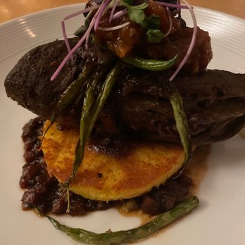 The Aerie - Lamb Shank with Polenta Cake - New American Near Me - Snowbird, Utah The Aerie - Lamb Shank with Polenta Cake - New American Near Me - Snowbird, Utah