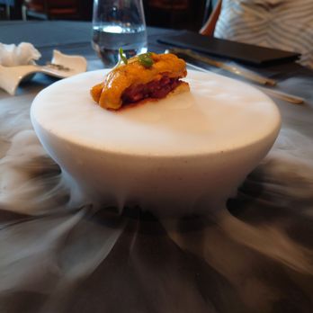 Omaniku - Fresh uni on top of steak tartare. The white stuff around the bowl is a fog coming out of the dish. Fun stuff - Asian Fusion Near Me - San Gabriel, California