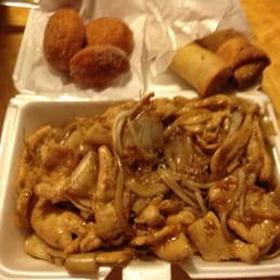 Chicken Chow Fun with egg roll, spring roll, and donuts