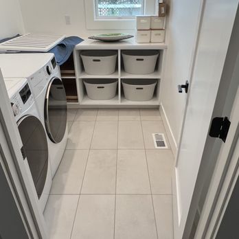 GoCo Construction - a laundry room with a washer and dryer - General Contractors Near Me - Renton, Washington GoCo Construction - a laundry room with a washer and dryer - General Contractors Near Me - Renton, Washington